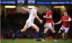  ?? Wales. Photograph: Andy Watts/INPHO/Shuttersto­ck ?? England’s Owen Farrell, who said his side took a ‘step forward’ in Cardiff, kicks against