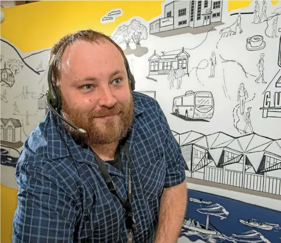  ??  ?? Wellington City Council call centre operator Ross Dutton takes calls on almost every imaginable topic. Photos: JOHN NICHOLSON/FAIRFAX NZ