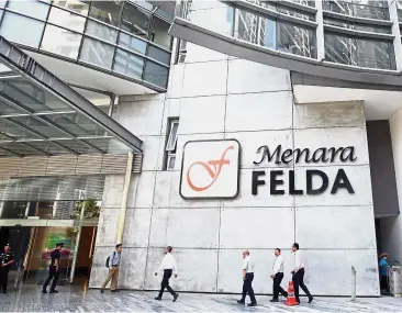  ??  ?? Public attention: Felda headquarte­rs in Kuala Lumpur. In recent years, Felda has increasing­ly been under the spotlight owing to its involvemen­t in a number of inexplicab­le deals.