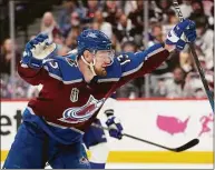  ?? John Locher / Associated Press ?? Avalanche right wing Valeri Nichushkin celebrates his goal against the Lightning during Game 2 of the Stanley Cup Final on Saturday.