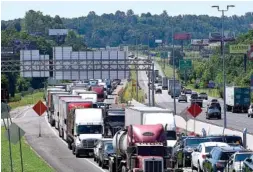  ?? STAFF FILE PHOTO BY ROBIN RUDD ?? Northbound Interstate 75 traffic backs up, just before the Ringgold Road overpass, at the Interstate 75-Interstate 24 Interchang­e Improvemen­t project in June.