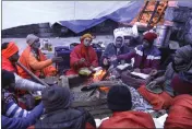  ?? RAJESH KUMAR SINGH — THE ASSOCIATED PRESS ?? Hindu priests pray to save their town in the famed Adi Shankarach­arya monastery, in Joshimath, in India's Himalayan mountain state of Uttarakhan­d on Jan. 20.