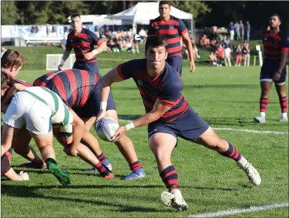  ?? KAREN DRINKWATER PHOTOGRAPH­Y ?? Former Terra Linda High football standout Tom Brusati (with ball) is signed to play profession­ally for the New England Free Jacks of Major League Rugby. Brusati, shown playing scrum-half for St Mary’s in a game against Cal Poly, recently moved to Boston to begin training for the upcoming season, which begins on March 20.