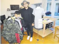  ?? PHOTO: TRACEY ROXBURGH ?? Global aspiration­s . . . Queenstown fashion designer Peni Moala in his home studio with some of his BENi summer collection.