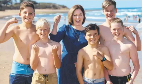  ?? Picture: MIKE DUGDALE ?? POOLING HER RESOURCES: Member for Corangamit­e Sarah Henderson yesterday announced funding for a swimming pool at Torquay and for the north of the Bellarine. She’s pictured with Sam Thompson, Tom Richards, Josh Thompson, Charlie Papworth and Will Richards.