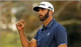  ?? ADAM HUNGER — THE ASSOCIATED PRESS ?? Dustin Johnson reacts after winning The Northern Trust golf tournament on a playoff hole over Jordan Spieth on Sunday in Old Westbury, N.Y.