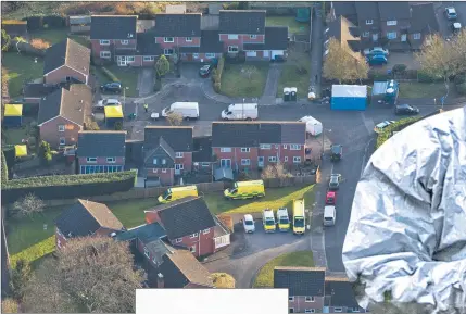  ??  ?? Above, police activity at Sergei Skripal’s house in Salisbury. Left, a contaminat­ed police car is taken away. Right, an investigat­or in protective clothing at the scene