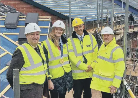  ?? ?? MILESTONE From left, Tim Forer, RNBT trustee, Olympic gold medallist Eilidh McIntyre, Ray Cornwell, LNT site manager, and Commander Rob Bosshardt, chief executive of the RNBT, outside the charity’s new care home for naval veterans