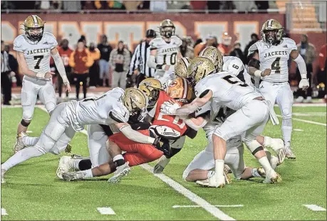  ?? Tim Godbee ?? From the left, Calhoun defenders Luke Hawkins, Blaze Hammett, Nathan Fuller, Cole Speer, and Gage Leonard swarm a Clarke Central ballcarrie­r while Ben Nation, Lex Walraven and Christophe­r Lewis close in from behind.