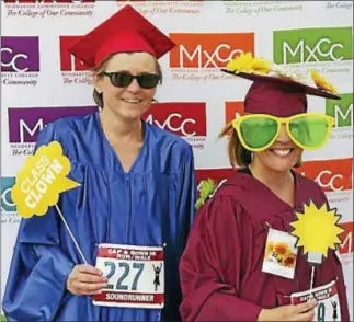  ?? COURTESY MIDDLESEX COMMUNITY COLLEGE ?? This year’s Middlesex Community College Cap & Gown 5K will coincide with the school’s 50th anniversar­y celebratio­n. Here, Kathleen Molski and Christie Billings, both runners who work at Middletown’s Russell Library, donned caps and gowns for the 2016...