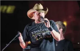  ??  ?? Jason Aldean performs during a surprise pop up concert at the Music City Center in Nashville, Tenn.