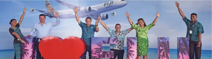  ?? Photo: Waisea Nasokia ?? Fiji Airways managing director chief executive officer Andre Viljoen, joined by Tourism Fiji CEO Brent Hill, Fiji Hotel and Tourism Associatio­n CEO Fantasha Lockington during the celebratio­n of the first year anniversar­y of the reopening of the border at teh Nadi Internatio­nal Airport on December 1,2022.