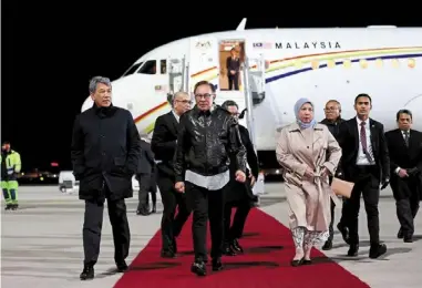  ?? — Bernama ?? Packed schedule: anwar arriving in Berlin for his official visit to Malaysia’s largest trading partner among eu member countries.