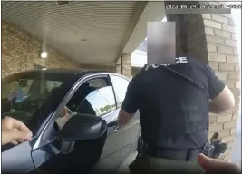  ?? BLENDON TOWNSHIP POLICE VIA THE ASSOCIATED PRESS ?? This image from bodycam video shows a bullet hole in the windshield of a car with Ta'Kiya Young inside after she was shot by a police officer outside a grocery store in Blendon Township, Ohio, on Aug. 24. Her death has prompted outrage and concerns.