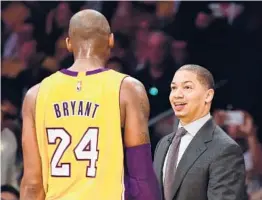  ?? HARRY HOW/GETTY ?? Tyronn Lue, now coach of the Clippers, says the tragic death of friend and former teammate Kobe Bryant remains an incredibly heavy emotional weight.