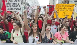  ?? DAVE SIDAWAY ?? Students from across the province of Quebec take to the streets of Montreal in March 2012 to demonstrat­e against rising tuition fees. What they accomplish­ed remains a matter for debate.