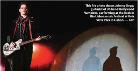  ??  ?? This file photo shows Johnny Depp, guitarist of US band Hollywood Vampires, performing at the Rock in Rio Lisboa music festival at Bela Vista Park in Lisbon. — AFP