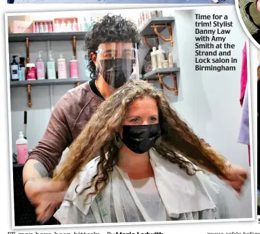  ??  ?? Time for a trim! Stylist st Danny Law w with Amy Smith at the he Strand and d Lock salon in Birmingham m