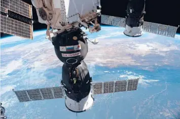  ?? NASA ?? A Soyuz spacecraft is docked May 3 with the Internatio­nal Space Station. When the space shuttle program ended, the Soyuz was American astronauts’ only ride to space for nearly a decade.