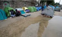  ?? PICTURE: PHILIPPE WOJAZER/REUTERS ?? Tents where migrants live in a makeshift camp along the Quai de Jemmapes of the canal Saint-Martin in Paris, France on Tuesday.