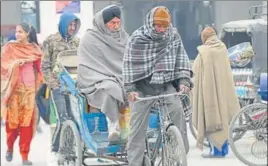  ?? BHARAT BHUSHAN/HT ?? ■
Best of the woollens were out as cold wave conditions intensifie­d in the region on Monday as is evident from the picture taken in Patiala.