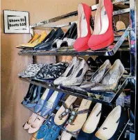  ?? [PHOTO BY JIM BECKEL, THE OKLAHOMAN] ?? Shoes are displayed in the Surayya Anne thrift store at 1143 N Meridian.