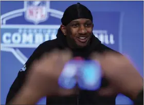  ?? MICHAEL CONROY — THE ASSOCIATED PRESS ?? Washington quarterbac­k Michael Penix speaks during a press conference at the NFL football scouting combine in Indianapol­is on Friday.