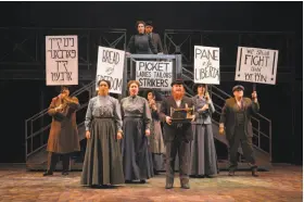  ?? Kevin Berne / TheatreWor­ks ?? Garment factory workers protest in the TheatreWor­ks production of “Rags.”