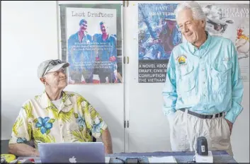  ?? Elizabeth Page Brumley Las Vegas Review-Journal ?? “Last Draftees” co-authors Vietnam veteran Robert Foust, left, and Keith Rogers, a former RJ reporter, talk in their “writing cave” at Rogers’ home in Las Vegas.