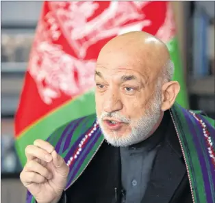  ?? AP PHOTO ?? Afghanista­n’s former president Hamid Karzai speaks during an interview with the Associated Press in Kabul, Afghanista­n, Wednesday.