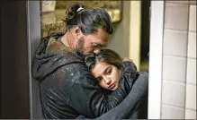  ?? CLAY ENOS/ NETFLIX VIA AP ?? Jason Momoa plays dad to Isabela Merced in “Sweet Girl,” a movie about a Pittsburgh father who vows revenge on a drug company he blames for his wife’s death.