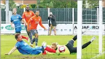  ??  ?? SAD FAREWELL: Shaw Lane AFC, in blue, are no more