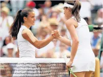  ??  ?? A BRIT SPECIAL Konta, right, sees off Maria Sakkari of Greece