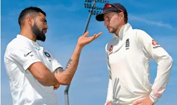  ??  ?? India captain Virat Kohli (left) and England skipper Joe Root in this file photo.