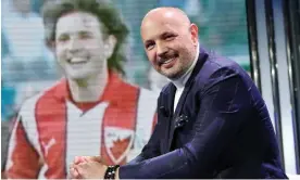  ?? Photograph: Maria Laura Antonelli/AGF/Shuttersto­ck ?? Sinisa Mihajlovic pictured in February 2021, in front of an image from his playing days.