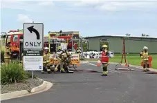  ?? Photo: Brooke Duncan ?? TOXIC GASES: Queensland Fire and Emergency Services crews at the Chinchilla Waste and Recycling Centre after aluminium phosphate canisters exploded on Monday.