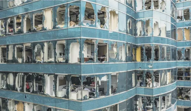  ?? PICTURE; GETTY IMAGES ?? 0 Windows were blown out in Hong Kong as the financial hub felt the full brunt of the Typhoon Mangkhut at the weekend