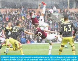  ?? — AFP ?? BURNLEY: Burnley’s English midfielder Ashley Westwood (CL) and Burnley’s English striker Ashley Barnes (CR) go for an overhead effort but fail to connect during the English Premier League football match between Burnley and Southampto­n at Turf Moor in Burnley, yesterday.