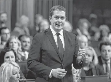 ?? SEAN KILPATRICK CP ?? Conservati­ve Leader Andrew Scheer rises during Question Period in the House of Commons in Ottawa on Tuesday. •