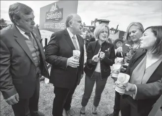  ?? Herald photo by Ian Martens ?? Mayor Chris Spearman, Cavendish Farms president Robert Irving, Premier Rachel Notley and Lethbridge MLAs Maria Fitzpatric­k and Shannon Phillips celebrate the Cavendish Farms groundbrea­king ceremony.