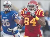  ?? NIKKI BOERTMAN/ THE COMMERCIAL APPEAL ?? Iowa State’s Ernst Brun scores on Tulsa during last year’s LIberty Bowl. The Cyclones brought 25,000 fans to Memphis, and starting next season a team from the Big 12 will match up against an SEC squad every year.