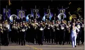  ?? CLIFFORD OTO/THE RECORD ?? The Tokay Royal Regiment marching band performs Saturday in the Grape Bowl Classic Band Review.