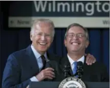  ?? SUCHAT PEDERSON/THE WILMINGTON NEWS-JOURNAL VIA AP ?? Anthony Coscia, right, Chairman of the Board for Amtrak, and Vice President Joe Biden enjoy a light moment at the Joseph R. Biden Jr. Railroad Station in Wilmington, Del., Friday.