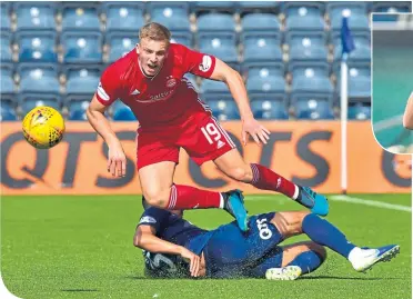  ??  ?? Kilmarnock’s Mohammed El Makrini puts in a hefty challenge on Lewis Ferguson