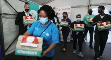  ?? | Armand Hough African News Agency (ANA) ?? THE SHOPRITE Checkers group donated 430 care packs to health-care workers at the Brackengat­e Intermedia­te Care Facility to honour their selfless acts of service. They also donated 150 care packs to Covid-19 patients.