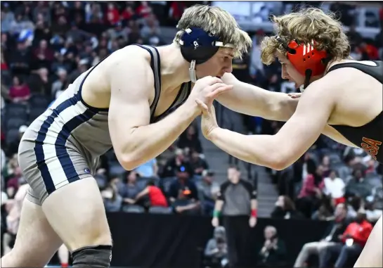  ?? ALISSA NOE — BOCOPREPS.COM ?? Legacy’s Quinn Funk, left, secured his spot in the Class 5A state title match with a 10-6win over Ponderosa’s Westin Hoffschnei­der during the state semifinals at Ball Arena in Denver on Friday.