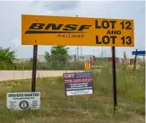  ??  ?? The area around the BNSF and UP facilities near Joliet is dotted with “help wanted” signs from trucking companies struggling with a shortage of drivers.