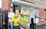  ??  ?? Homethomas Stanfield and Fiona Kerr with their children in Bellshill