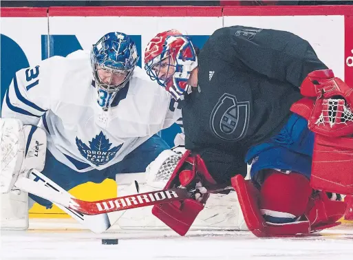  ?? ICON SPORTSWIRE GETTY IMAGES ?? Frederik Andersen chats with Carey Price before Wednesday’s game. Since joining the Leafs, Andersen has put up some impressive numbers against Montreal.