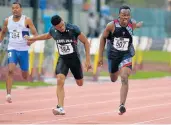  ?? Picture: GALLO IMAGES ?? OPTING OUT: Ncincilili Titi, centre, and Clarence Munyai tussle it out in the National Track and Field Championsh­ip.